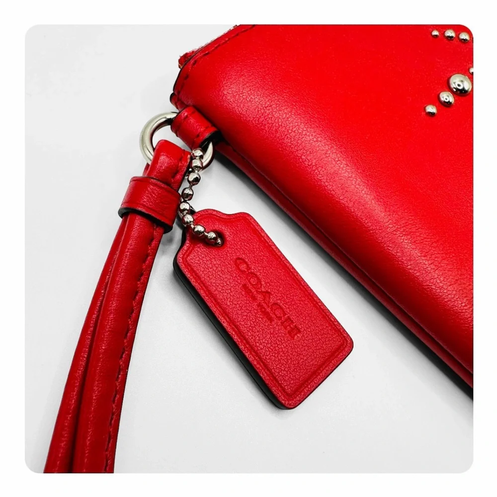 β
Coach RARE Western Rivets Wristlet - Red/Silver β
- Picture 13 of 16